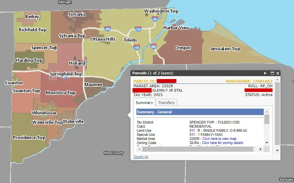Screenshot of the map of Lucas County and a floating tab of parcel details from the township of Spencer showing the parcel and assessor's numbers, and property details.
